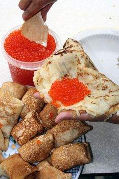 Russian pancakes with caviar of fish - national tradition