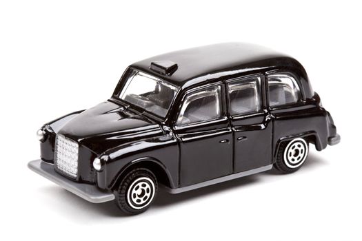 A traditional London Taxi over a white background.