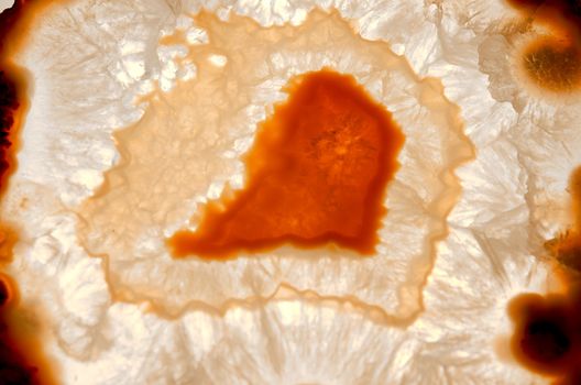 Close up of a thinly sliced backlit natural agate