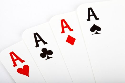 The four Aces from a set of playing cards.