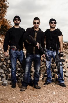 View of a group of gang members with guns.