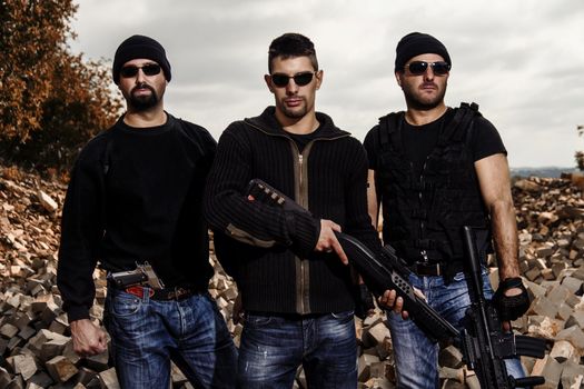 View of a group of gang members with guns.