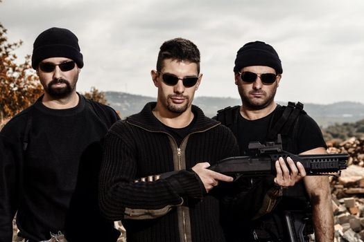 View of a group of gang members with guns.