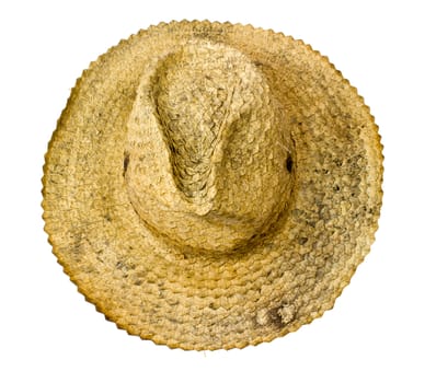 Top view of a old round straw hat on a white background.