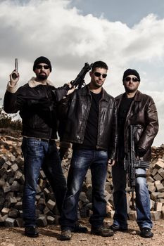 View of a group of gang members with guns.