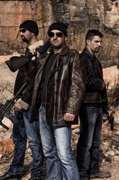 View of a group of gang members with guns.