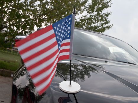 stars and stripes on shiny car