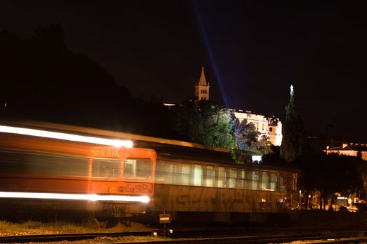 autumn night in Pula with train in front view