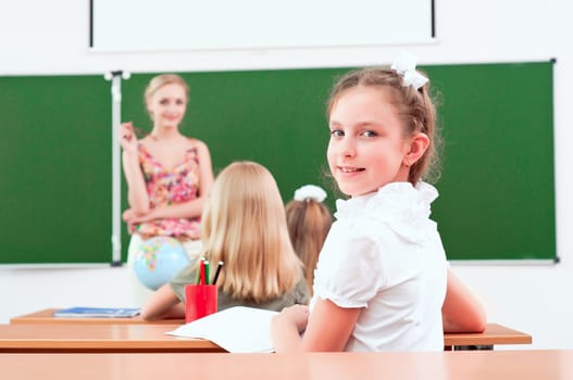 portrait of the girl in the class, the teacher tells the next school board