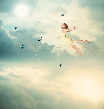 Little Blonde Girl Flying with Butterflies at Twilight 