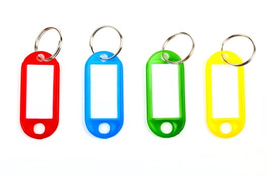 Coloured Key Tags over a white background.