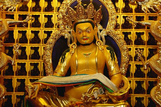 Statue of Yellow Jambhala- the God of fortune