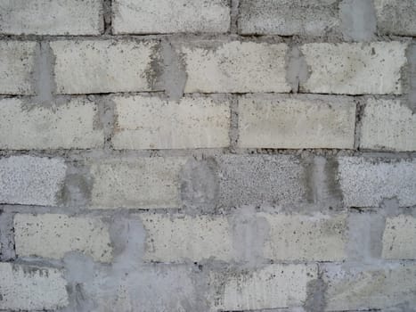               General view of the texture of the walls, lined with cinder block                