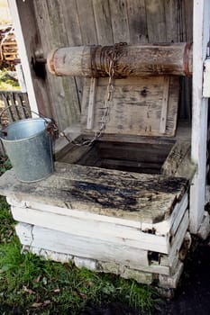 Wooden well in village