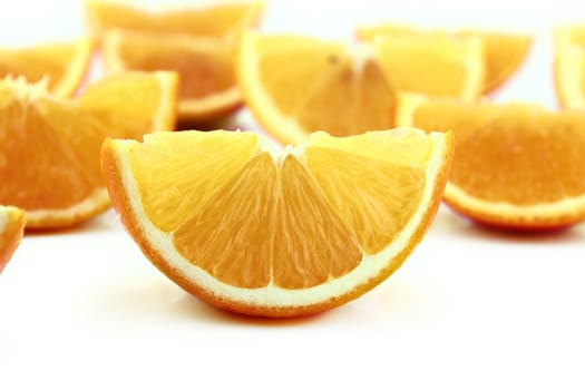 Sweet Orange segments or slices on white.
