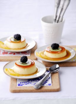 Custard pudding on white plate