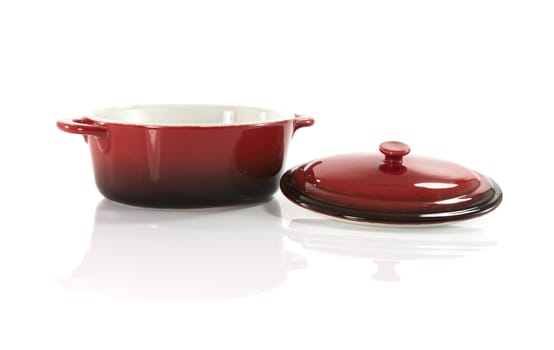 red frying pan isolated on white