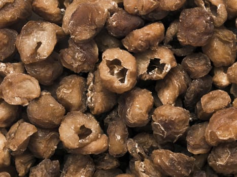 close up of a heap of dried longan food background