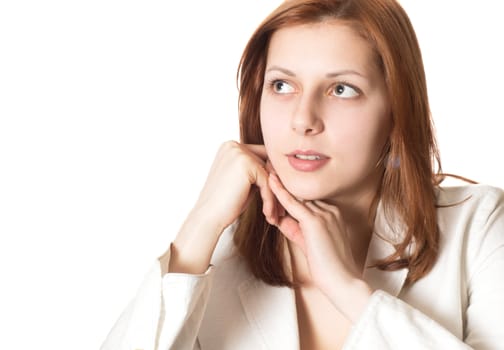 Beautiful green-eyed girl with golden hair on a white background isolated