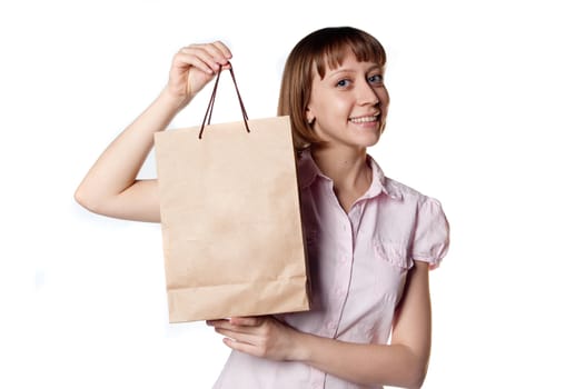 young girl with packages in hands