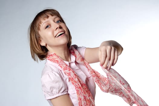 a young girl wearing a light scarf