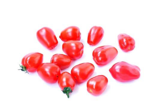 Cherry tomato fruits on a white background