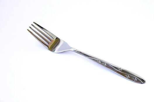Stainless fork on a white background