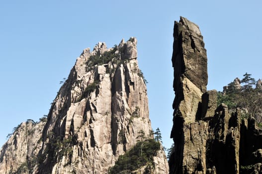 Rock mountains against blue sky