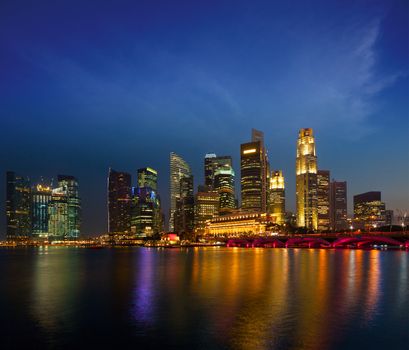 Singapore skyline and Marina Bay in evening