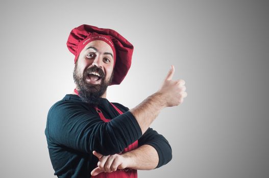 happy bearded chubby chef on gray background