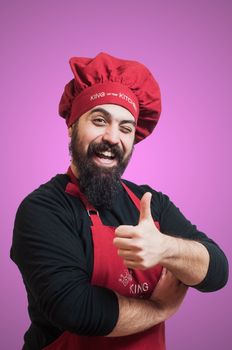 happy bearded chubby chef on pink background