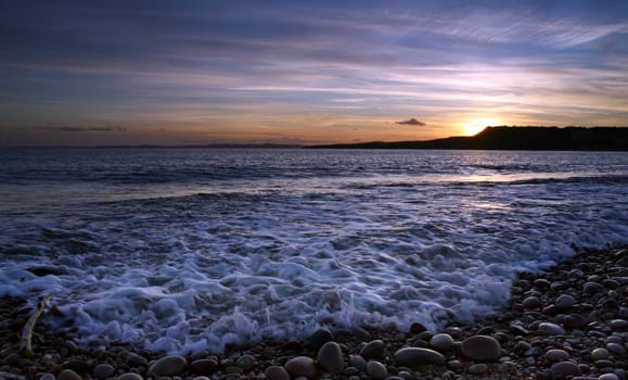 Vibrant sunset on the beach at sunset, Devon