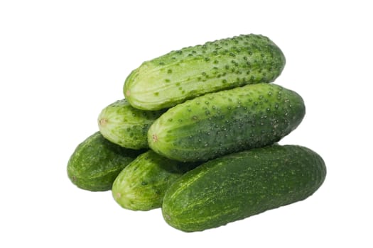heap of  fresh raw  cucumbers isolated on white background 