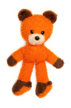 old orange bear toy isolated on white