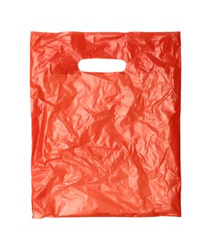 close up of a orange plastic bag on white background with clipping path