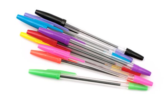 A set of transparent colored pens on a white background