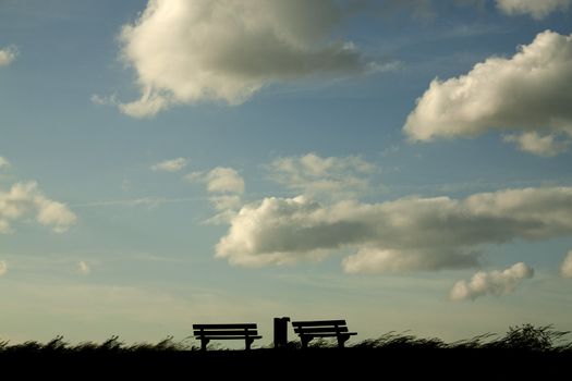 Two benches in de evening sun