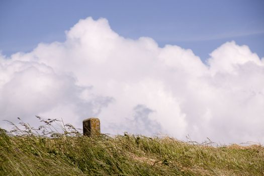 Mile stone at a dike in Holland