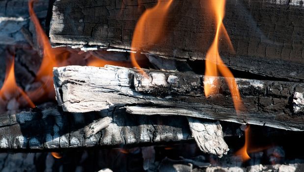 Burning wood on the barbecue