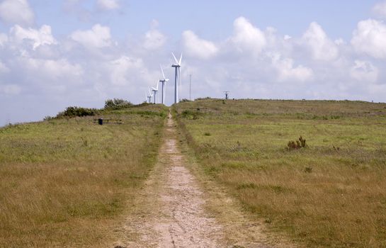 Wind-turbines on a hill in the port of Rotterdam