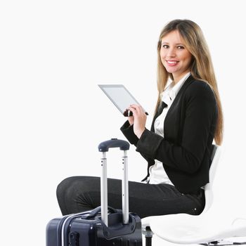 Businesswoman using tablet computer on white background