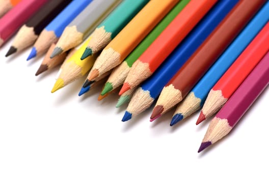 Colour pencils isolated on white background close up