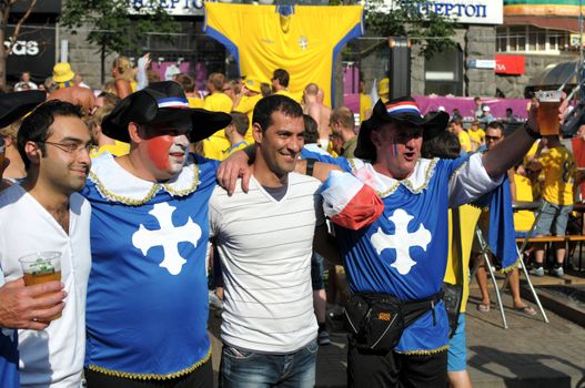 KYIV, UKRAINE - JUNE 19 2012: Official fan zone on Khreshatyk street. France football fans before start match Sweden - France, Group D. EURO 2012 in Kyiv, 19 june 2012.