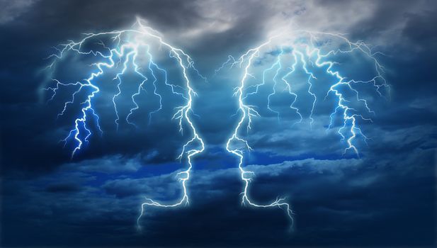 Power meeting and team ideas as a group of two electric lightning bolt strikes in the shape of a human head illuminated on a storm cloud night sky as an intelligent partnership.