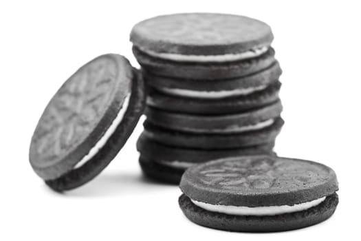 Oreo-style cookies over a white background.