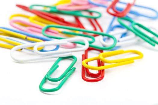 Paper Clips over a white background.