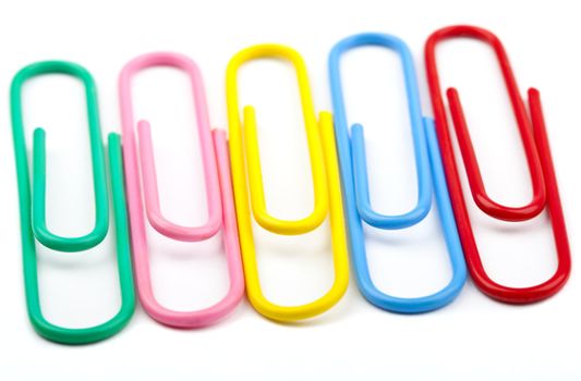 Paper Clips over a white background.