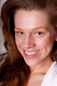 Laughing beauty caucasian teenager, close-up portrait with focus on eyes