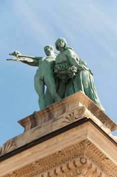 Symbolic figures of work and wellbeing - Heroe's square Budapest, Hungary