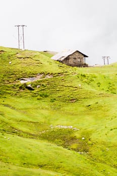 Old stone traditional house in the mountains, Himalayas, India